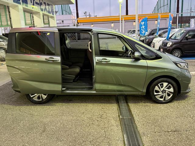 フリードハイブリッド ハイブリッド・Gホンダセンシング アダプティブクルコン ナビ ホンダセンシング アダプティブクルーズコントロール レーンキープ 両側パワースライドドア 純正インターナビ Bluetooth バックカメラ ビルトインETC 前後ドラレコ 前席シートヒータ 試乗OK(11枚目)