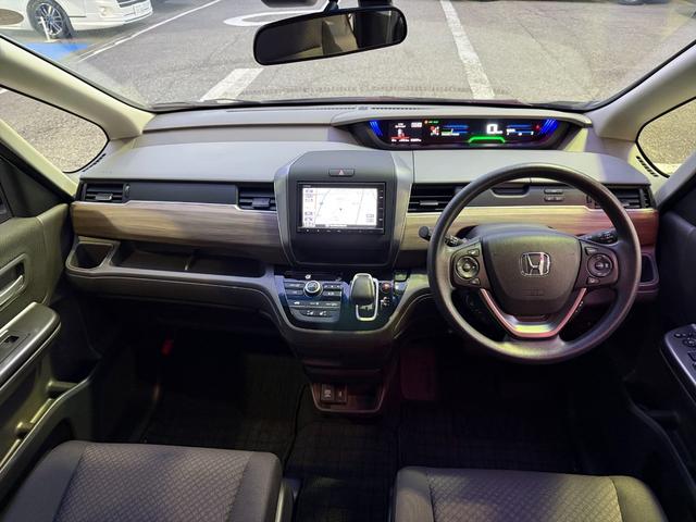 フリードハイブリッド ハイブリッド・Gホンダセンシング アダプティブクルコン ナビ ホンダセンシング アダプティブクルーズコントロール レーンキープ 両側パワースライドドア 純正インターナビ Bluetooth バックカメラ ビルトインETC 前後ドラレコ 前席シートヒータ 試乗OK(34枚目)