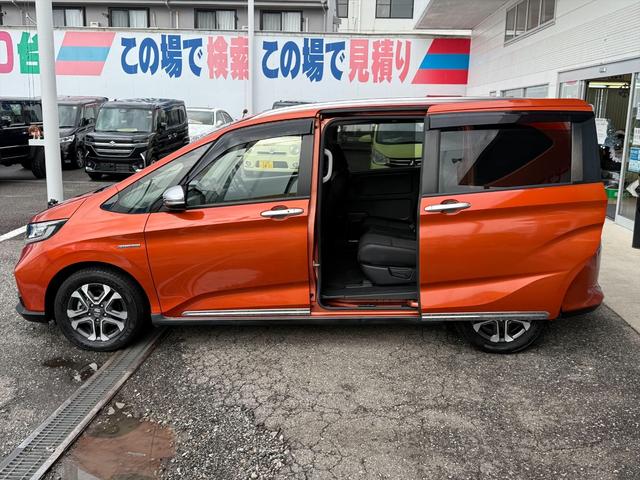 フリード+ハイブリッド ハイブリッド・クロスターホンダセンシングアダプティブクルコン ホンダセンシング CMBS アダプティブクルコン LKA 9型ナビTV Bカメラ ブルートゥース DVD再生 CD録音 両側パワスラ アップルカープレイ ハーフレザーシート ビルトインETC 試乗OK(5枚目)