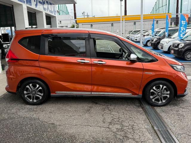 フリード+ハイブリッド ハイブリッド・クロスターホンダセンシングアダプティブクルコン ホンダセンシング CMBS アダプティブクルコン LKA 9型ナビTV Bカメラ ブルートゥース DVD再生 CD録音 両側パワスラ アップルカープレイ ハーフレザーシート ビルトインETC 試乗OK(9枚目)