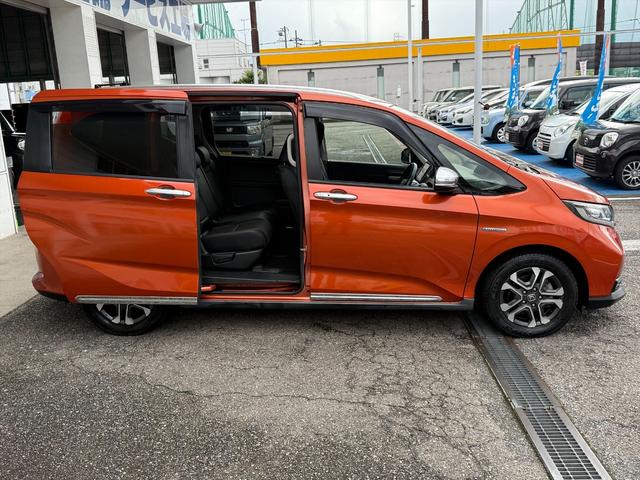 フリード+ハイブリッド ハイブリッド・クロスターホンダセンシングアダプティブクルコン ホンダセンシング CMBS アダプティブクルコン LKA 9型ナビTV Bカメラ ブルートゥース DVD再生 CD録音 両側パワスラ アップルカープレイ ハーフレザーシート ビルトインETC 試乗OK(10枚目)