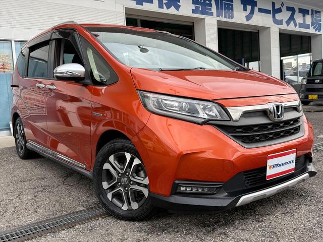 フリード+ハイブリッド ハイブリッド・クロスターホンダセンシングアダプティブクルコン ホンダセンシング CMBS アダプティブクルコン LKA 9型ナビTV Bカメラ ブルートゥース DVD再生 CD録音 両側パワスラ アップルカープレイ ハーフレザーシート ビルトインETC 試乗OK(11枚目)