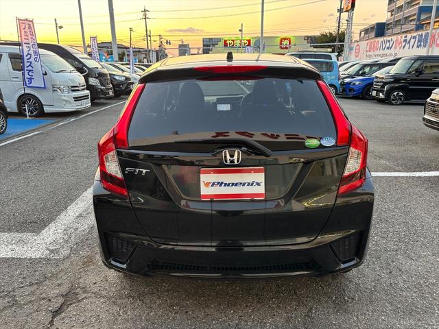 フィット 13G・Fパッケージ 純正ナビTV スマートキー 試乗OK 純正インターナビ 地デジTV ブルートゥース DVD再生 スマートキー プッシュスタート ETC アイドリングストップ 電格ミラー VSA ECON オートエアコン ヘッドライトレベライザー 試乗OK(7枚目)