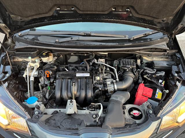 フィット 13G・Fパッケージ 純正ナビTV スマートキー 試乗OK 純正インターナビ 地デジTV ブルートゥース DVD再生 スマートキー プッシュスタート ETC アイドリングストップ 電格ミラー VSA ECON オートエアコン ヘッドライトレベライザー 試乗OK(11枚目)