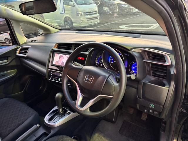 フィット 13G・Fパッケージ 純正ナビTV スマートキー 試乗OK 純正インターナビ 地デジTV ブルートゥース DVD再生 スマートキー プッシュスタート ETC アイドリングストップ 電格ミラー VSA ECON オートエアコン ヘッドライトレベライザー 試乗OK(30枚目)