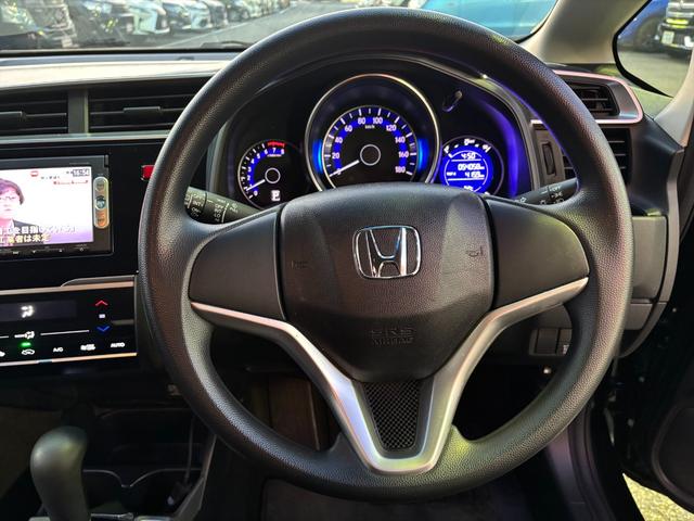 フィット 13G・Fパッケージ 純正ナビTV スマートキー 試乗OK 純正インターナビ 地デジTV ブルートゥース DVD再生 スマートキー プッシュスタート ETC アイドリングストップ 電格ミラー VSA ECON オートエアコン ヘッドライトレベライザー 試乗OK(36枚目)