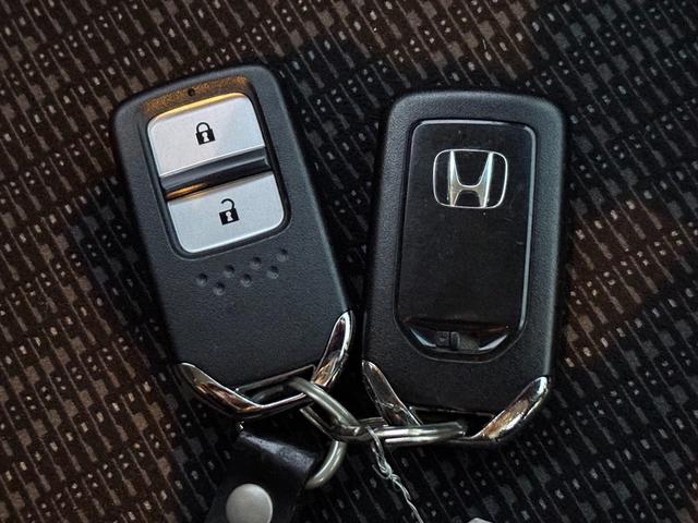 フィット 13G・Fパッケージ 純正ナビTV スマートキー 試乗OK 純正インターナビ 地デジTV ブルートゥース DVD再生 スマートキー プッシュスタート ETC アイドリングストップ 電格ミラー VSA ECON オートエアコン ヘッドライトレベライザー 試乗OK(69枚目)