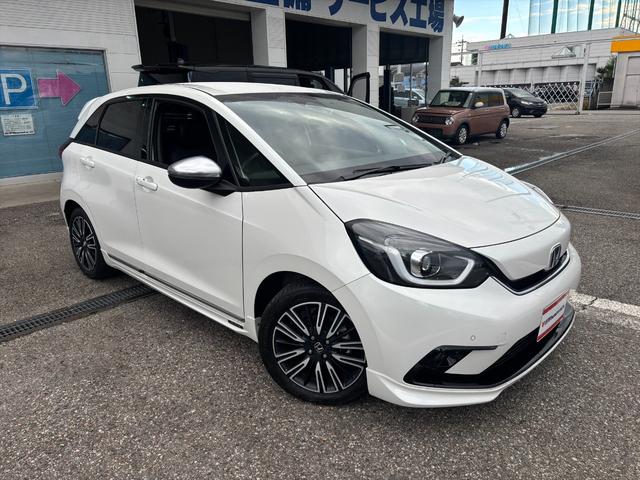 フィット e:HEVリュクス モデューロフルエアロ ホンダセンシング ModuloエアロFSR ホンダセンシング アダプティブクルーコントロール 純正9インチナビ フルセグ バックカメラ Bluetooth ビルトインETC 前後ドラレコ シートヒーター 試乗OK(5枚目)