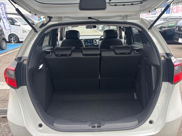 フィット e:HEVリュクス モデューロフルエアロ ホンダセンシング ModuloエアロFSR ホンダセンシング アダプティブクルーコントロール 純正9インチナビ フルセグ バックカメラ Bluetooth ビルトインETC 前後ドラレコ シートヒーター 試乗OK(26枚目)