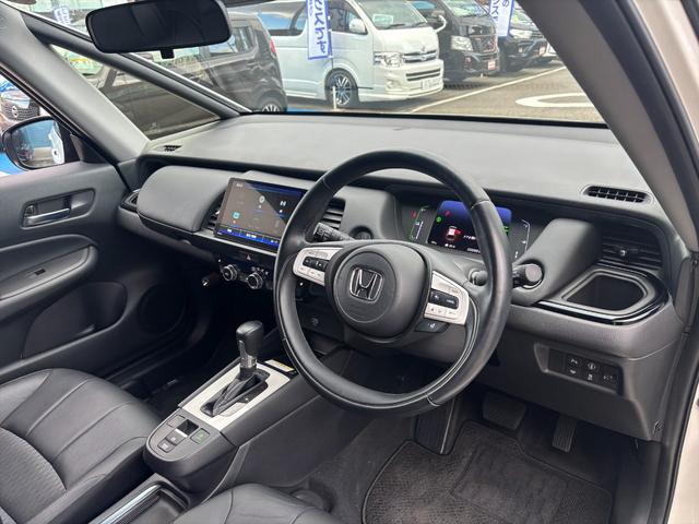 フィット e:HEVリュクス モデューロフルエアロ ホンダセンシング ModuloエアロFSR ホンダセンシング アダプティブクルーコントロール 純正9インチナビ フルセグ バックカメラ Bluetooth ビルトインETC 前後ドラレコ シートヒーター 試乗OK(33枚目)