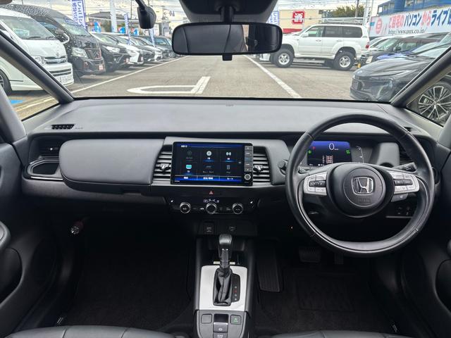 フィット e:HEVリュクス モデューロフルエアロ ホンダセンシング ModuloエアロFSR ホンダセンシング アダプティブクルーコントロール 純正9インチナビ フルセグ バックカメラ Bluetooth ビルトインETC 前後ドラレコ シートヒーター 試乗OK(37枚目)