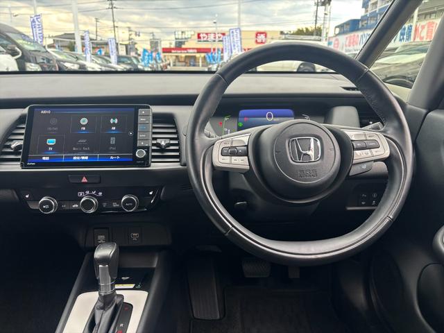フィット e:HEVリュクス モデューロフルエアロ ホンダセンシング ModuloエアロFSR ホンダセンシング アダプティブクルーコントロール 純正9インチナビ フルセグ バックカメラ Bluetooth ビルトインETC 前後ドラレコ シートヒーター 試乗OK(38枚目)
