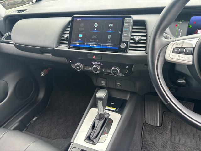 フィット e:HEVリュクス モデューロフルエアロ ホンダセンシング ModuloエアロFSR ホンダセンシング アダプティブクルーコントロール 純正9インチナビ フルセグ バックカメラ Bluetooth ビルトインETC 前後ドラレコ シートヒーター 試乗OK(50枚目)