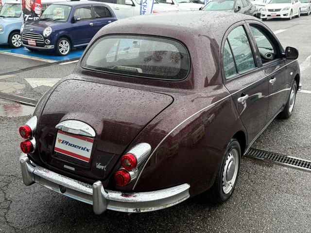 ビュート 12STプレミアム専用メッキバンパー専用ウッドパネル試乗OK 車検R9年5月まで メッキバンパー ウッドパネル トランクダンパー ライトレベライザー 間欠ワイパー ストラーダSDナビ Bluetooth フルセグTV バックカメラ ドラレコ ETC 試乗OK(5枚目)