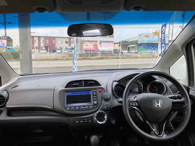 フィットシャトル １５Ｘ　４ＷＤ　ＥＴＣ　バックカメラ　ナビ　アルミホイール　電動格納ミラー　ＡＴ　盗難防止システム　衝突安全ボディ　ＡＢＳ　ＣＤ　エアコン　パワーステアリング　パワーウィンドウ（2枚目）