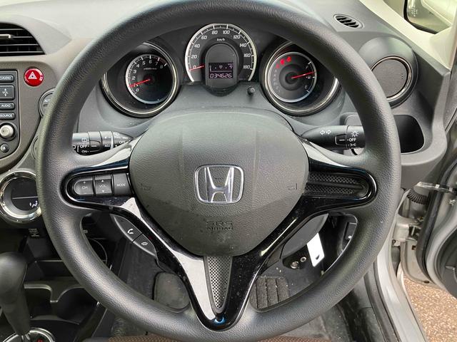 フィットシャトル １５Ｘ　４ＷＤ　ＥＴＣ　バックカメラ　ナビ　アルミホイール　電動格納ミラー　ＡＴ　盗難防止システム　衝突安全ボディ　ＡＢＳ　ＣＤ　エアコン　パワーステアリング　パワーウィンドウ（3枚目）