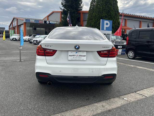 3シリーズ 320iグランツーリスモ Mスポーツ 純正ナビ バックカメラ パドルシフト メモリ付パワーシート オートライト オートエアコン オートワイパー クルーズコントロール ステアリングスイッチ 電動リヤゲート フォグライト前後 純正AW ETC(9枚目)