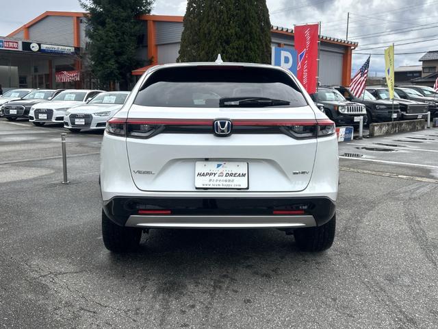 ヴェゼル ｅ：ＨＥＶ　Ｚ　１オーナー　フルセグメモリーナビ　バックカメラ　パドルシフト　機能照明　ＢＳＭ　オートライト　オートエアコン　シートヒーター　ＡＣＣ　ステアリングスイッチ　純正ＡＷ　フォグライト　電動リヤゲート（10枚目）