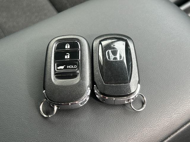 ヴェゼル ｅ：ＨＥＶ　Ｚ　１オーナー　フルセグメモリーナビ　バックカメラ　パドルシフト　機能照明　ＢＳＭ　オートライト　オートエアコン　シートヒーター　ＡＣＣ　ステアリングスイッチ　純正ＡＷ　フォグライト　電動リヤゲート（52枚目）