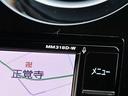 日産純正ナビゲーションMM318D-Wが付いています。