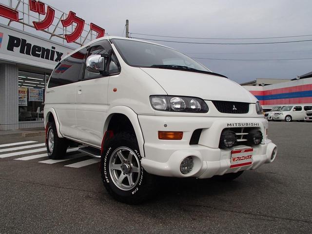 シャモニー 切替4WD 社外メモリーナビ フルセグTV KYBリフトアップショック オーバーフェンダー オートステップ ETC コーナーセンサー BFグッドリッチホワイトレタータイヤ ブロウズ16AW 社外HID(4枚目)