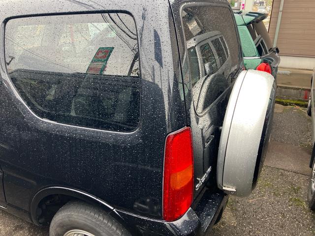 ジムニー ランドベンチャー 4WD ターボ キーレスエントリー 純正16インチアルミ 背面タイヤ CDオーディオ 電動格納ミラー シートヒーター(4枚目)