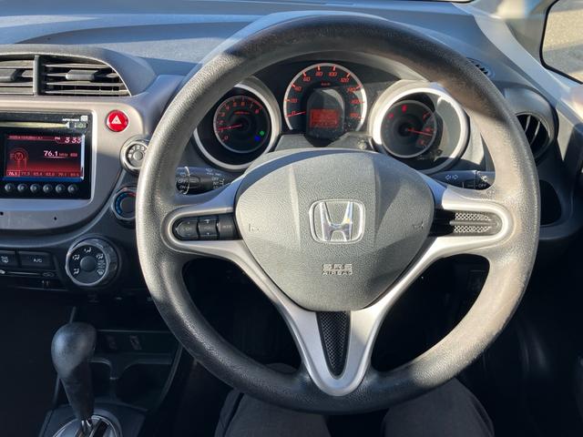 フィット Gスマートセレクション 純正CDオーディオ・バックカメラ USB入力 スマートキー 電動格納ミラー 社外アルミホイール 運転席・助手席エアバッグ(18枚目)