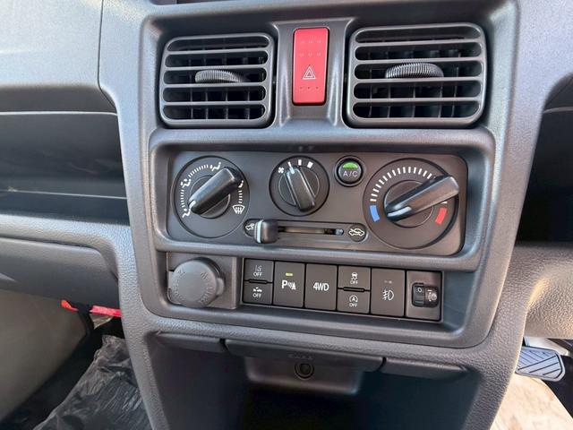 スーパーキャリイ X 4WD 届出済未使用車 AT 衝突被害軽減システム クリアランスソナー レーンアシスト アイドリングストップ 電動格納ミラー オートライト ESC(4枚目)