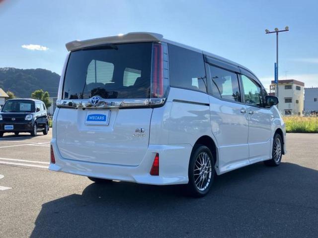 ノア ハイブリッドSiダブルバイビー 新品タイヤ/保証書/純正 10インチ メモリーナビ/フリップダウンモニター 純正 12.1インチ/トヨタセーフティセンス/両側電動スライドドア/シートヒーター 前席/車線逸脱防止支援システム 禁煙車(3枚目)