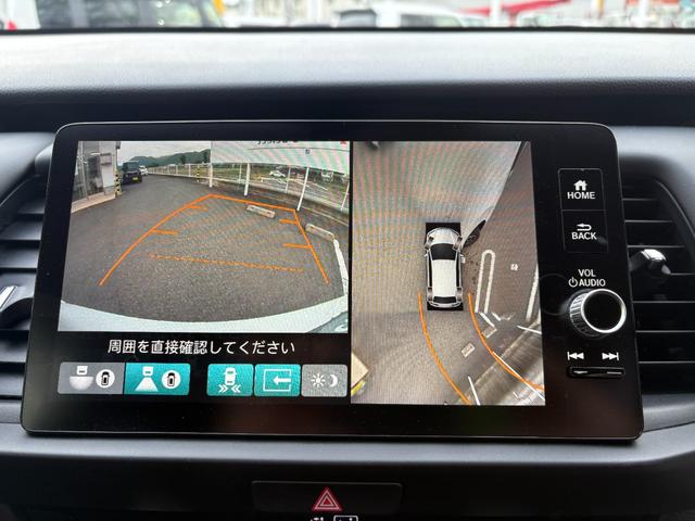フィット ｅ：ＨＥＶリュクス　４ＷＤ　クルコン　Ｂカメラ　ＡＡＣ　キーレス　サイドエアバック　ＥＴＣ　スマートキー　エアバッグ　ＵＳＢ　シートヒター　横滑り防止機能　ＬＥＤヘッドライ（10枚目）