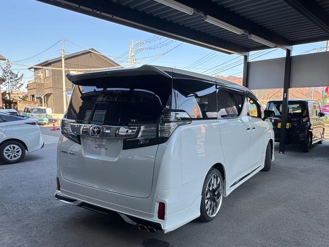 ヴェルファイア ２．５Ｚ　Ａエディション　モデリスタエアロ・ＴＲＤ足廻・２０インチアルミ・アルパインナビＴＶ／ブルートゥースオーディオ・バックカメラ・後席モニター・両側パワースライドドア・黒革調シートカバー（5枚目）