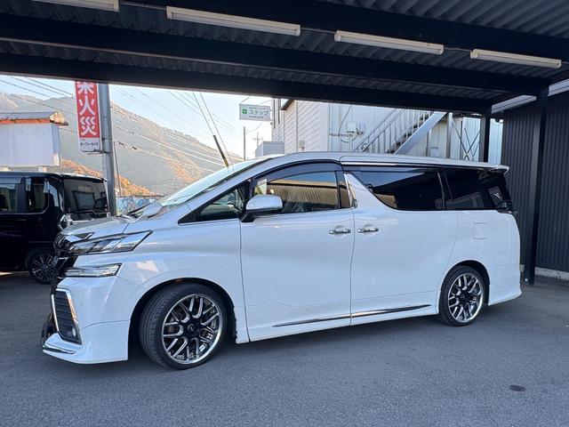 ヴェルファイア ２．５Ｚ　Ａエディション　モデリスタエアロ・ＴＲＤ足廻・２０インチアルミ・アルパインナビＴＶ／ブルートゥースオーディオ・バックカメラ・後席モニター・両側パワースライドドア・黒革調シートカバー（9枚目）