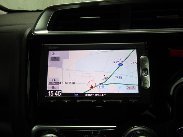 フィット 13G・Fパッケージ 中古スタッドレスホイール付 純正ナビゲーション バックカメラ ETC プッシュスタート(19枚目)