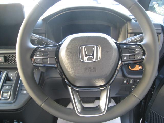 ステップワゴン ｅ：ＨＥＶスパーダ　１１．４インチ純正ナビ　バックカメラ　ホンダコネクト　ホンダセンシング　バックカメラ　オットマン　ハーフレザー　シートヒーター　ＬＥＤオートライト　パーキングセンサー　７人乗　フロアマット　デモカー（10枚目）