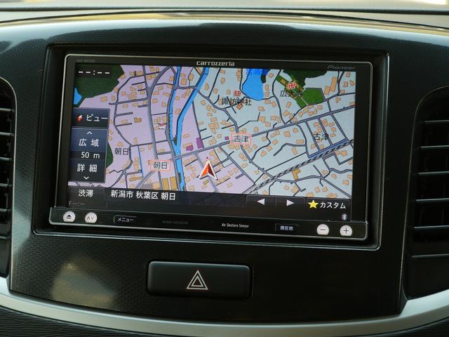 ワゴンＲスティングレー Ｊスタイル　４ＷＤ　Ｂｌｕｅｔｏｏｔｈ接続　社外メモリナビ／フルセグＴＶ　ＨＩＤヘッドライト　純正１４インチアルミホイール　オートライト　衝突被害軽減ブレーキ　アイドリングストップ　シートヒーター　スマートキー（4枚目）