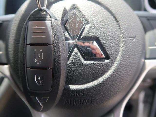 T 純正オーディオ クリアランスソナー LEDヘッド 衝突軽減装置 スマートキー 電動格納ミラー 純正15インチAW アイドリングストップ 前席シートヒーター 記録簿 禁煙車(8枚目)