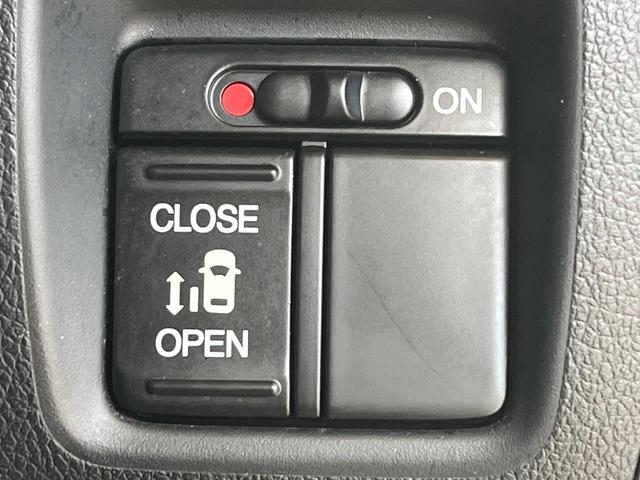 N-BOXカスタム G・Lパッケージ 電動スライドドア 純正SDナビ バックカメラ 禁煙車 スマートキー HIDヘッド ETC オートライト オートエアコン 純正14インチアルミ CD DVD再生 地デジ(4枚目)