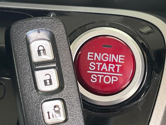 N-BOXカスタム G・Lパッケージ 電動スライドドア 純正SDナビ バックカメラ 禁煙車 スマートキー HIDヘッド ETC オートライト オートエアコン 純正14インチアルミ CD DVD再生 地デジ(7枚目)