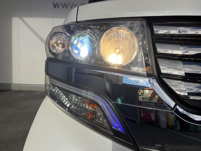 N-BOXカスタム G・Lパッケージ 電動スライドドア 純正SDナビ バックカメラ 禁煙車 スマートキー HIDヘッド ETC オートライト オートエアコン 純正14インチアルミ CD DVD再生 地デジ(12枚目)