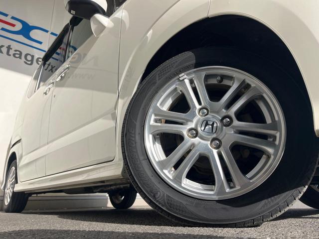 N-BOXカスタム G・Lパッケージ 電動スライドドア 純正SDナビ バックカメラ 禁煙車 スマートキー HIDヘッド ETC オートライト オートエアコン 純正14インチアルミ CD DVD再生 地デジ(13枚目)