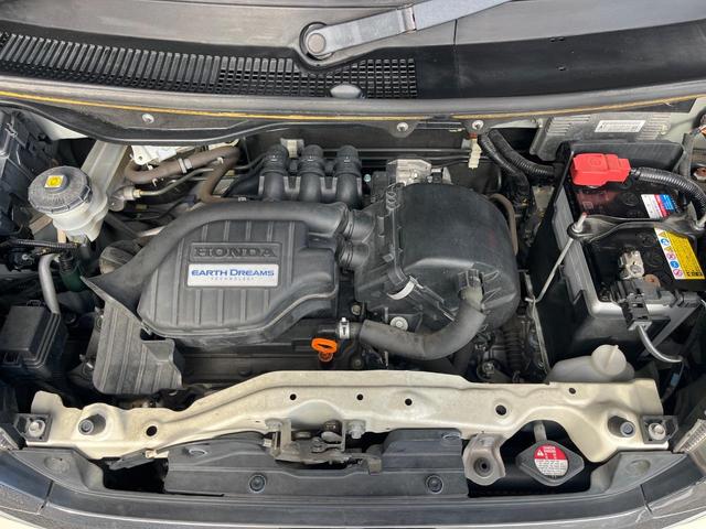 N-BOXカスタム G・Lパッケージ 電動スライドドア 純正SDナビ バックカメラ 禁煙車 スマートキー HIDヘッド ETC オートライト オートエアコン 純正14インチアルミ CD DVD再生 地デジ(18枚目)