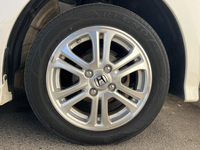 N-BOXカスタム G・Lパッケージ 電動スライドドア 純正SDナビ バックカメラ 禁煙車 スマートキー HIDヘッド ETC オートライト オートエアコン 純正14インチアルミ CD DVD再生 地デジ(24枚目)