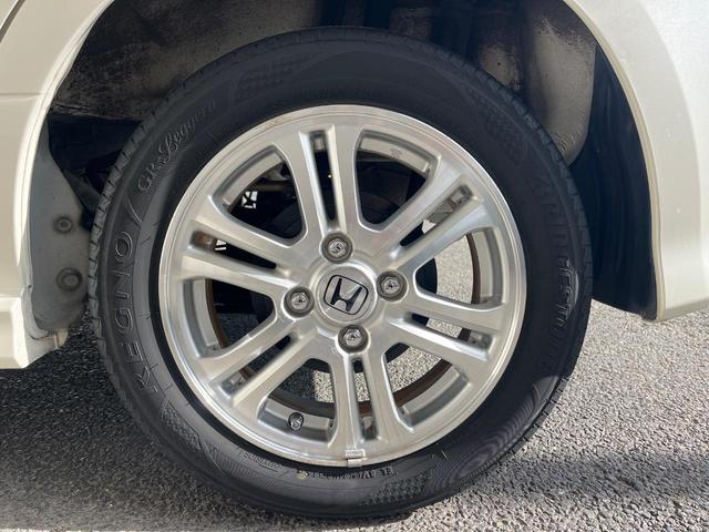 N-BOXカスタム G・Lパッケージ 電動スライドドア 純正SDナビ バックカメラ 禁煙車 スマートキー HIDヘッド ETC オートライト オートエアコン 純正14インチアルミ CD DVD再生 地デジ(26枚目)