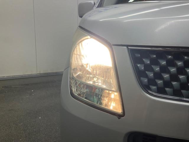 ワゴンＲ ＦＸリミテッド　禁煙車　スマートキー　純正１４インチアルミホイール　オーディオ　プライバシーガラス　ドアバイザー（10枚目）