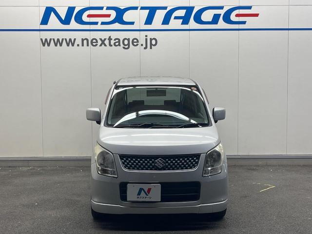 ワゴンＲ ＦＸリミテッド　禁煙車　スマートキー　純正１４インチアルミホイール　オーディオ　プライバシーガラス　ドアバイザー（12枚目）