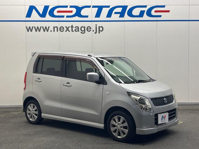 ワゴンＲ ＦＸリミテッド　禁煙車　スマートキー　純正１４インチアルミホイール　オーディオ　プライバシーガラス　ドアバイザー（14枚目）