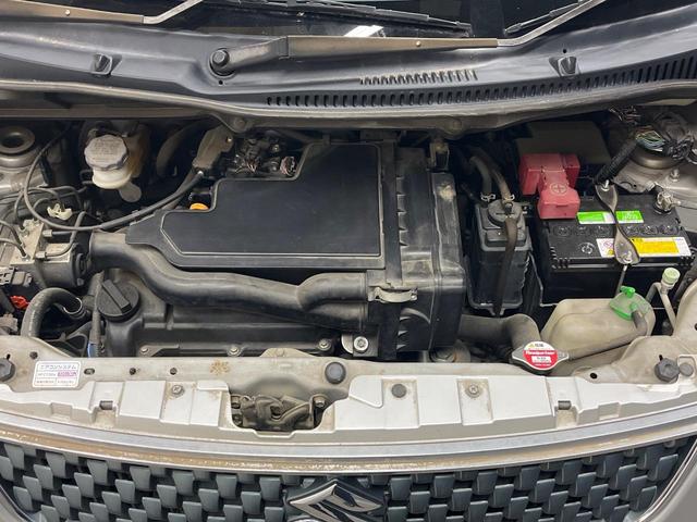 ワゴンＲ ＦＸリミテッド　禁煙車　スマートキー　純正１４インチアルミホイール　オーディオ　プライバシーガラス　ドアバイザー（16枚目）