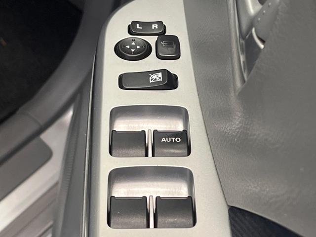 ワゴンＲ ＦＸリミテッド　禁煙車　スマートキー　純正１４インチアルミホイール　オーディオ　プライバシーガラス　ドアバイザー（21枚目）