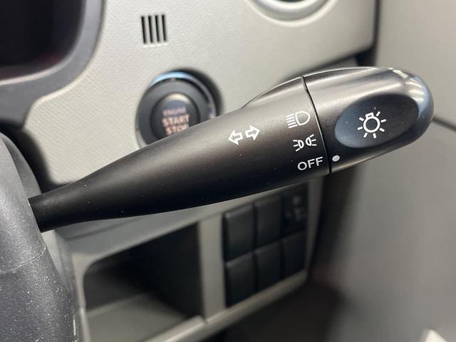 ワゴンＲ ＦＸリミテッド　禁煙車　スマートキー　純正１４インチアルミホイール　オーディオ　プライバシーガラス　ドアバイザー（23枚目）