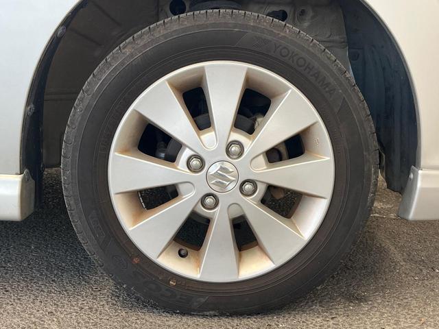 ワゴンＲ ＦＸリミテッド　禁煙車　スマートキー　純正１４インチアルミホイール　オーディオ　プライバシーガラス　ドアバイザー（32枚目）